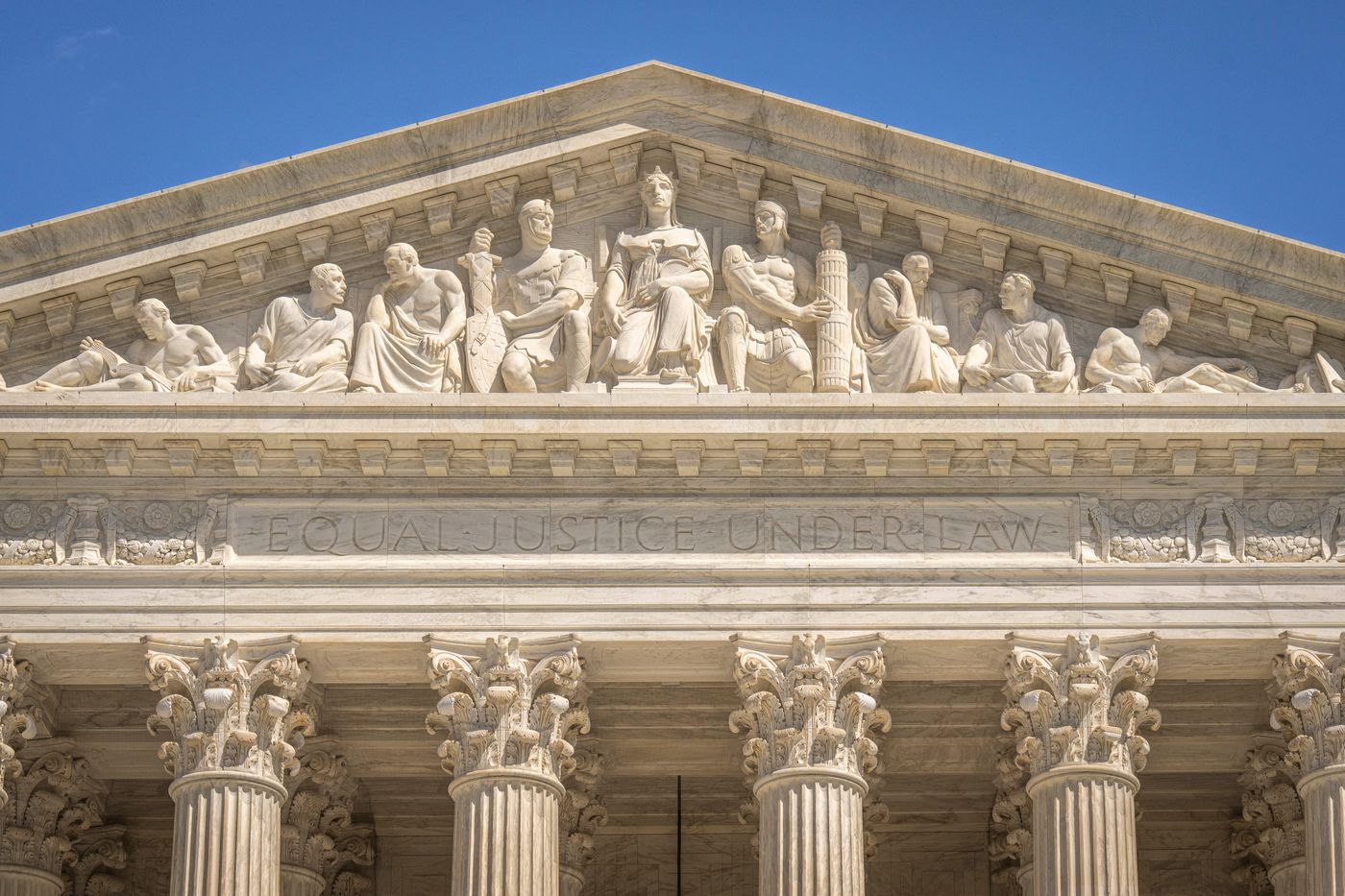 Sculpted pediment above courthouse columns
