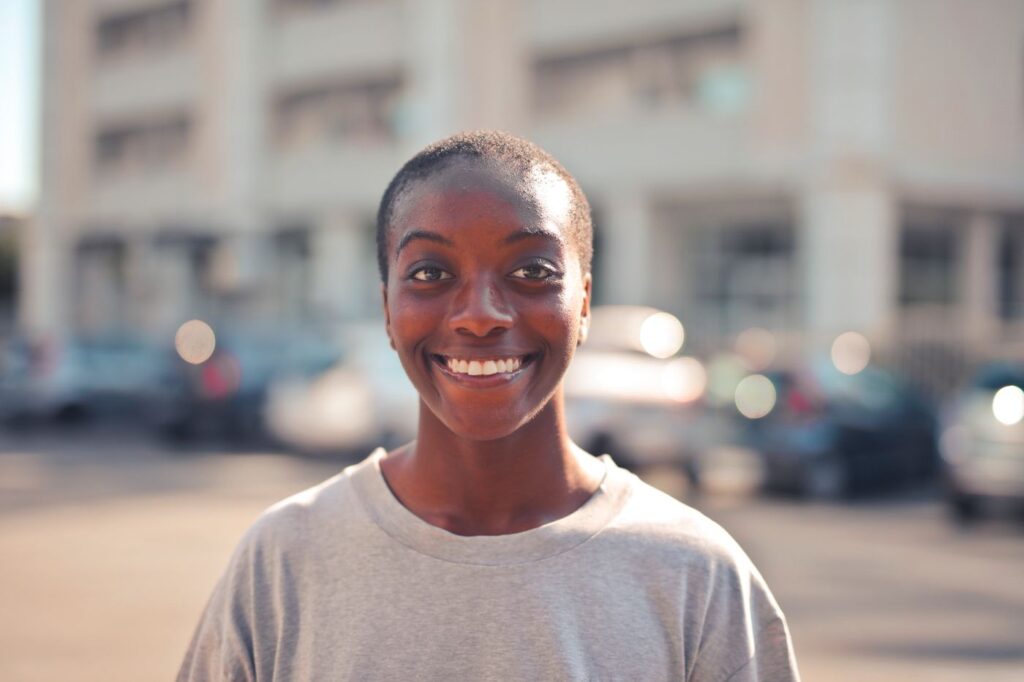 Smiling, confident woman outdoors in the city
